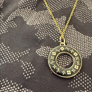 LV designer circle stainless gold necklace approximately 20 inches